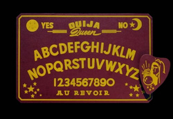 Ouija Queen (brown)-American Novelty Company, Omaha, NE c. 1943 - c. 1945